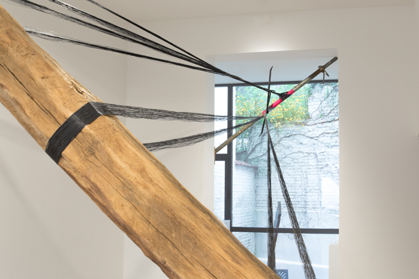 Diagonal, 2016, wood, steel wire, metal bar, scaffolding, 550 x 300 x 100 cm