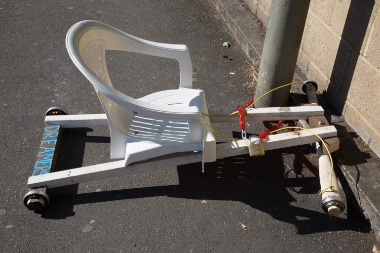 Dreamers / From Series Brujitas 2017, Locked in London. Found wood, plastic chair, electrical cable, lock and ball bearings. 120cm x 70cm x 60cm