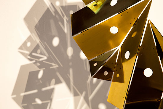 Sun Power 21 Sculpture. Metal with brass shine coated 110 cm x 110 cm x 15 cm, 1/3 + AP 2021 Santiago Reyes Villaveces